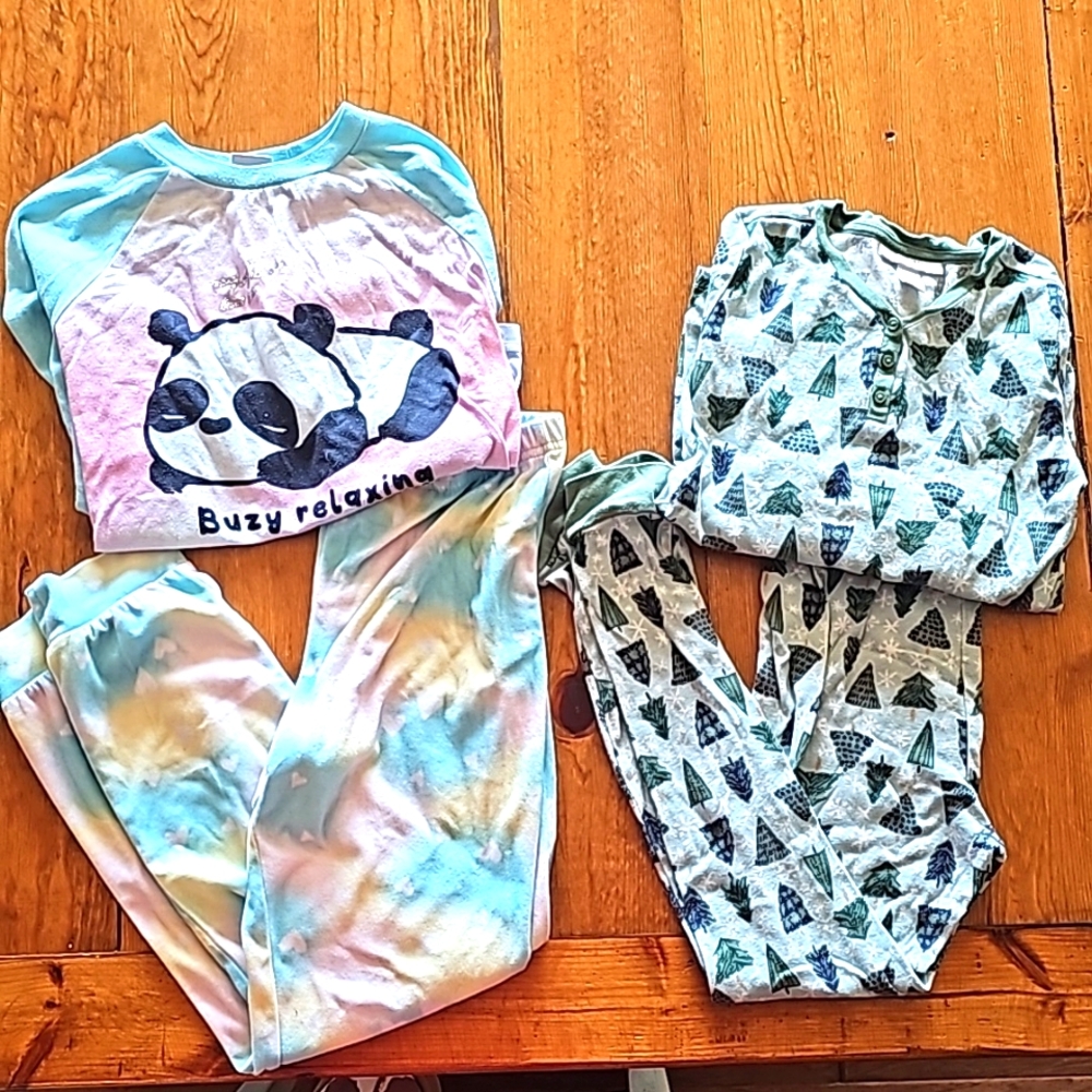 2 sets of Girls long sleeved PJs